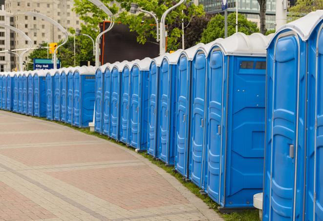 a row of sleek and modern portable restrooms at a special outdoor event in Brooklyn Center MN